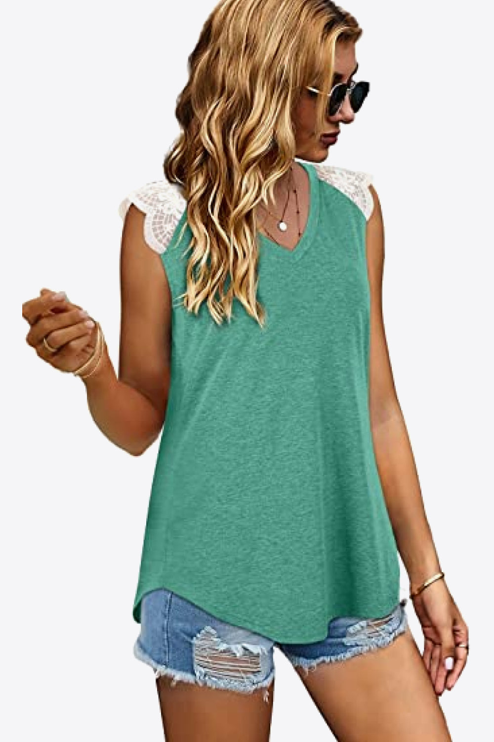 Spliced Lace Curved Hem Blouse