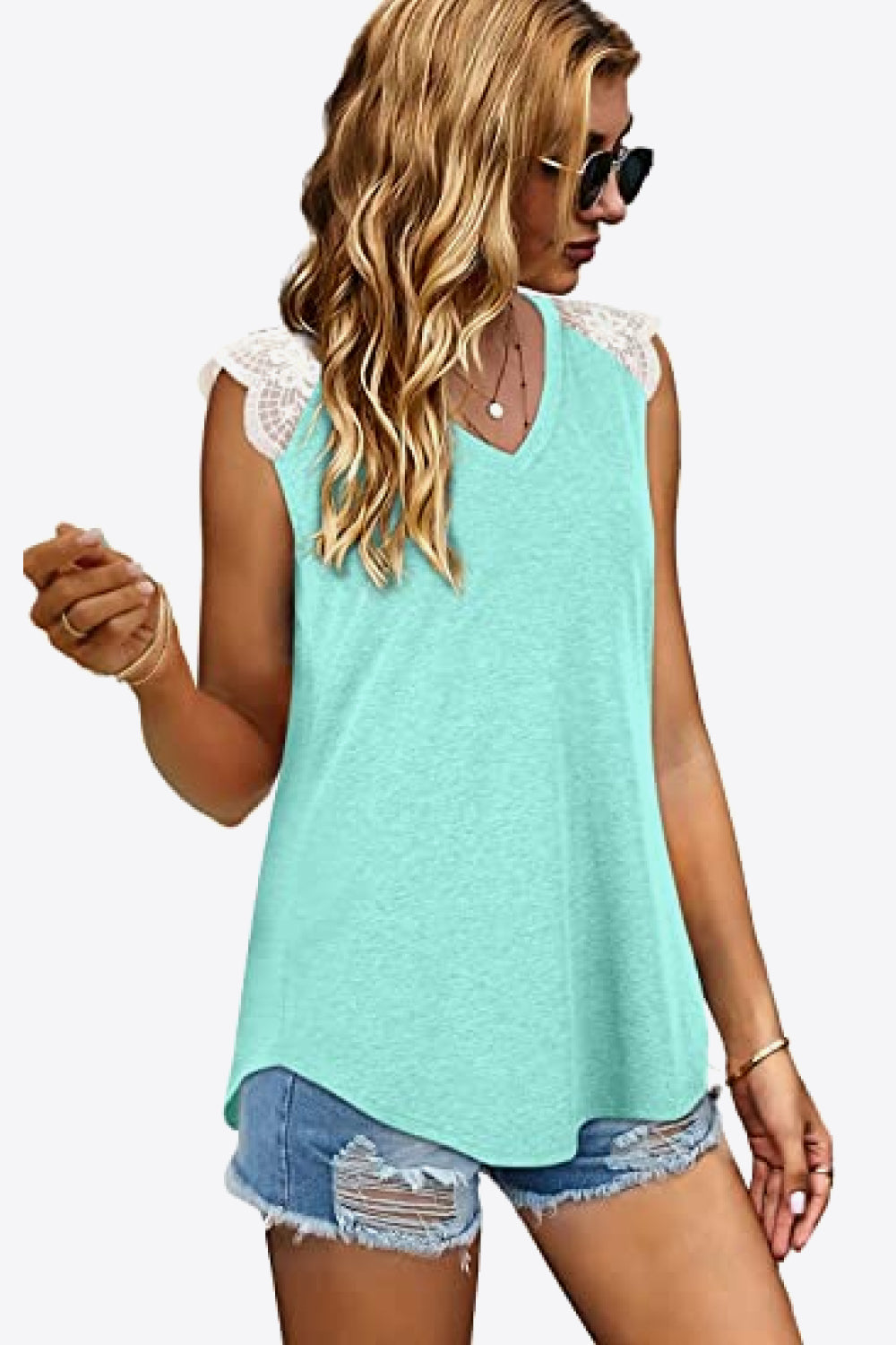 Spliced Lace Curved Hem Blouse
