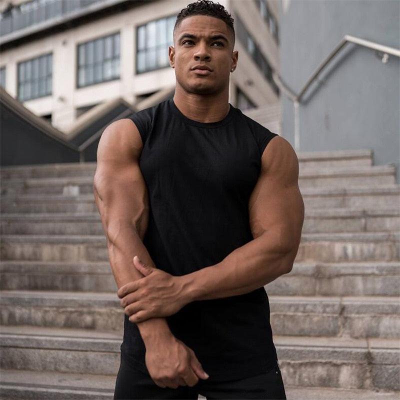 Summer Newest Brand Mens Curved Hem Solid Color Gyms Stringers - Vest Bodybuilding Clothing Fitness Man Tanks Tops (TM7)(1U101)(1U100)