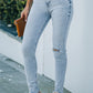 Light Wash Distressed Skinny Jeans with Pockets