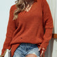 Distressed V-Neck Rib-Knit Sweater