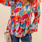 Brush Stroke Ruffled Tie Neck Blouse