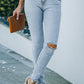 Light Wash Distressed Skinny Jeans with Pockets