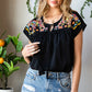 Embroidered Tie-Neck Tassel Blouse