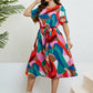 Plus Size Printed Round Neck Tie Belt Dress