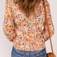 Floral Buttoned Plunge Peplum Blouse