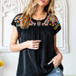 Embroidered Tie-Neck Tassel Blouse