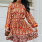 Printed Balloon Sleeve Tassel Tie Dress