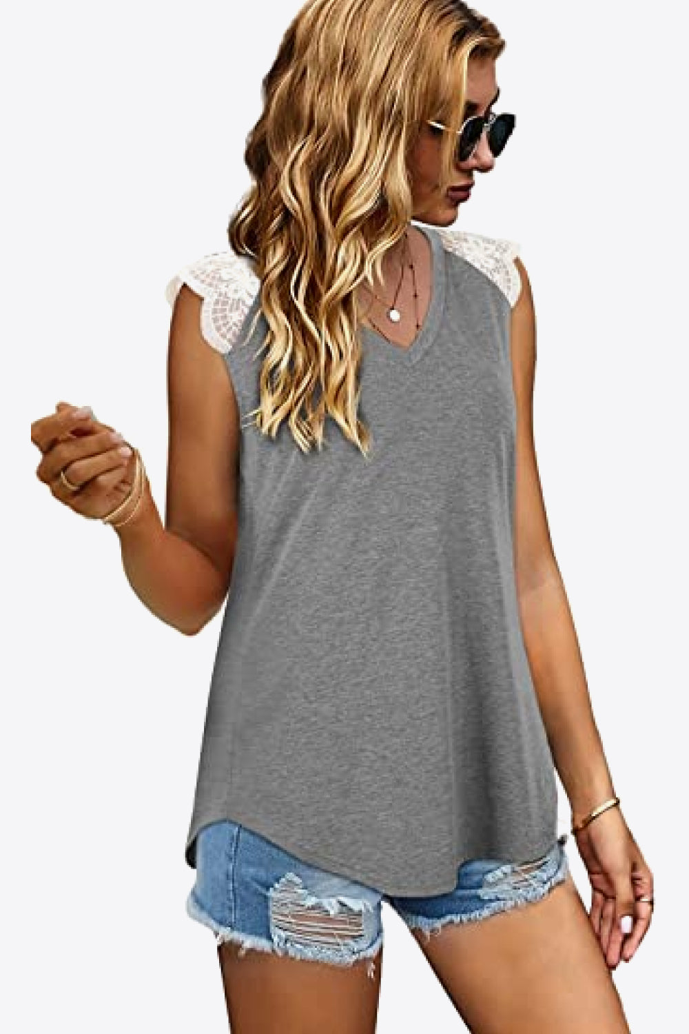 Spliced Lace Curved Hem Blouse
