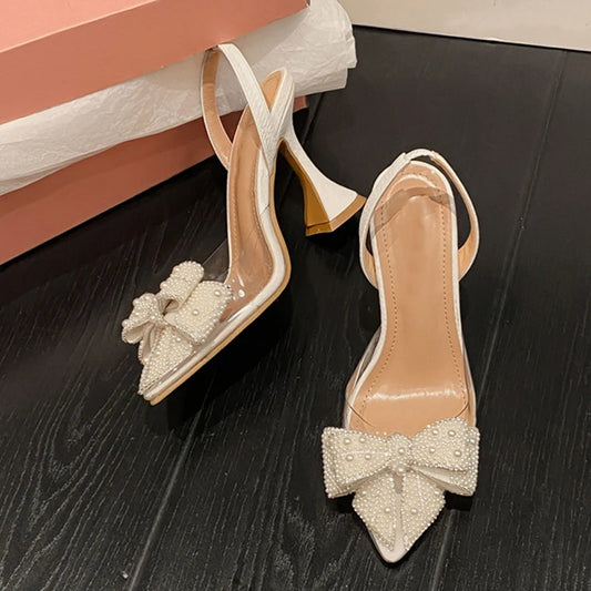 Liyke Fashion Design White Pearl Bowknot Women Pumps Sexy Pointed Toe High Heels Wedding Prom Shoe PVC Transparent Sandal Female