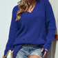 Distressed V-Neck Rib-Knit Sweater