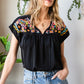 Embroidered Tie-Neck Tassel Blouse