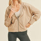 Kimberly C Full Size Zip-Up Drop Shoulder Hooded Jacket in Taupe