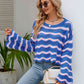 Round Neck Openwork Flare Sleeve Knit Top