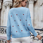 Heart Print V-Neck Dropped Shoulder Sweater