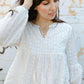 Tassel Tie Eyelet Babydoll Blouse