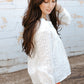 Tassel Tie Eyelet Babydoll Blouse