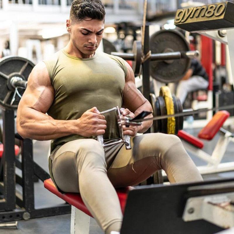 Summer Newest Brand Mens Curved Hem Solid Color Gyms Stringers - Vest Bodybuilding Clothing Fitness Man Tanks Tops (TM7)(1U101)(1U100)